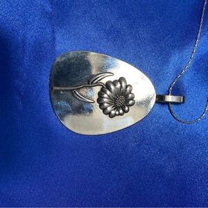 Elegant Silver Floral Pendant